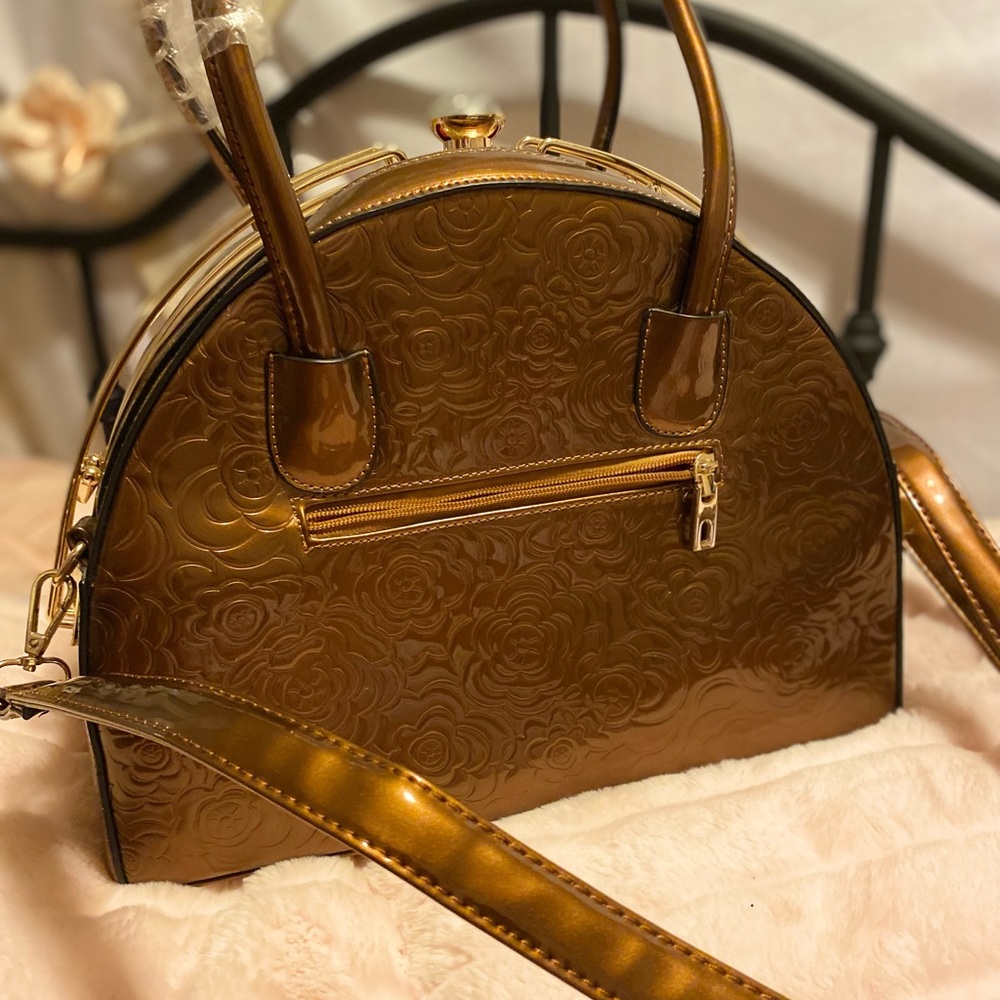 Bronze Floral Embossed Purse with Diamond snap.